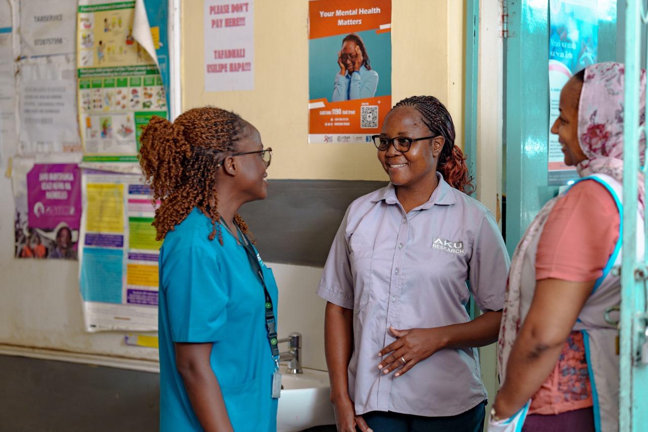 Radiographier Stacy Otieno talking to other women at Kilifi County’s Rabai Sub-County Hospital, Kenya.